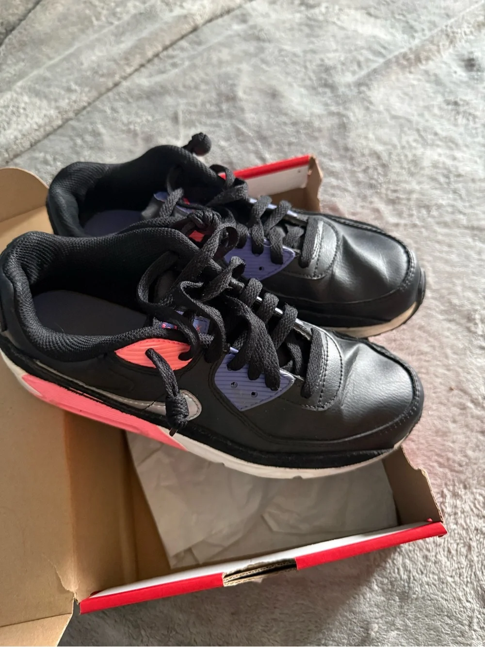 Nike Kids Black Sneakers with Pink and Purple Accents and White Swoosh